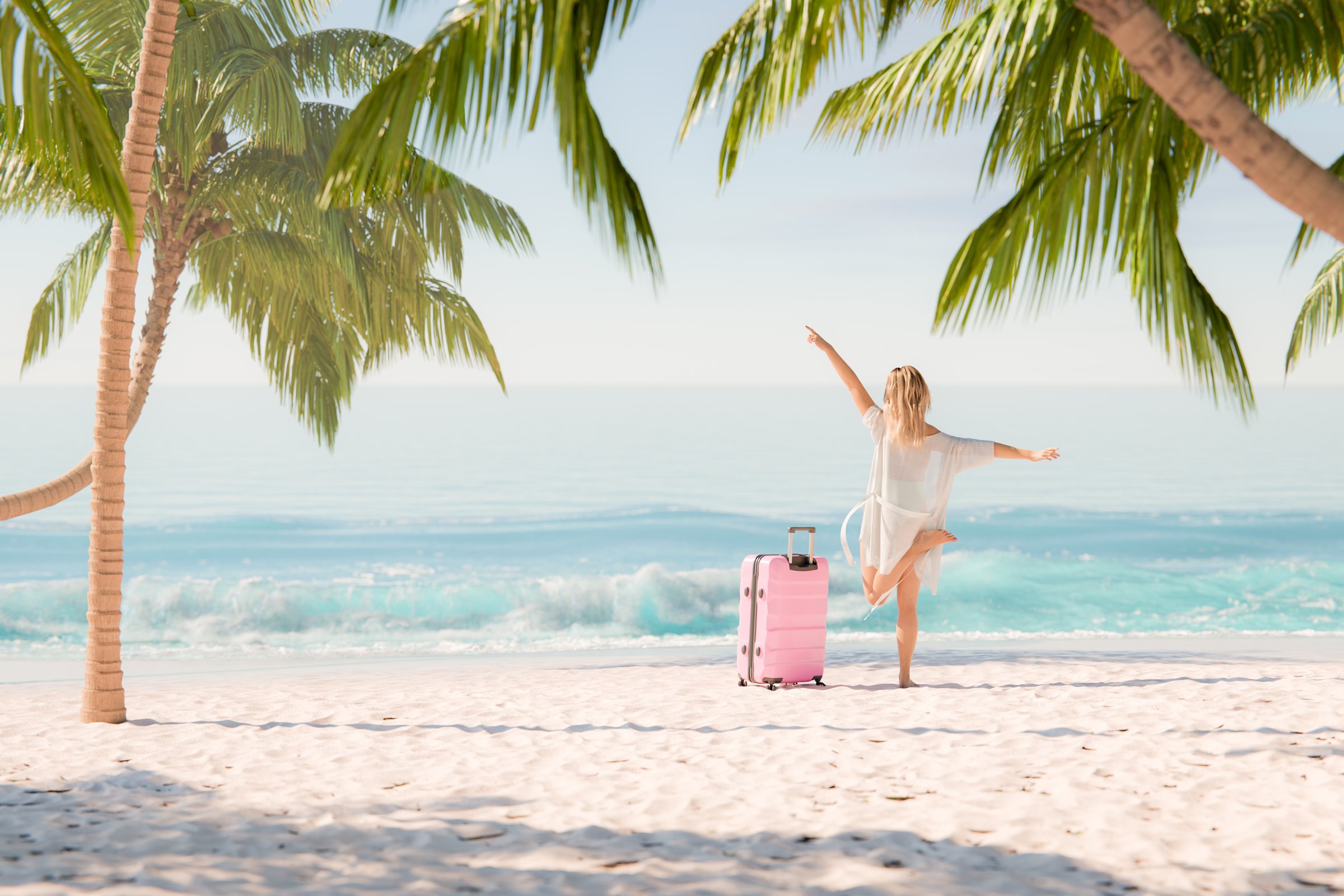 Young woman with arms raised in a white cover-up celebrating her arrival at a tropical beach with a pink suitcase and palm trees framing a clear blue ocean. 3d rendering. 3d character. No real person