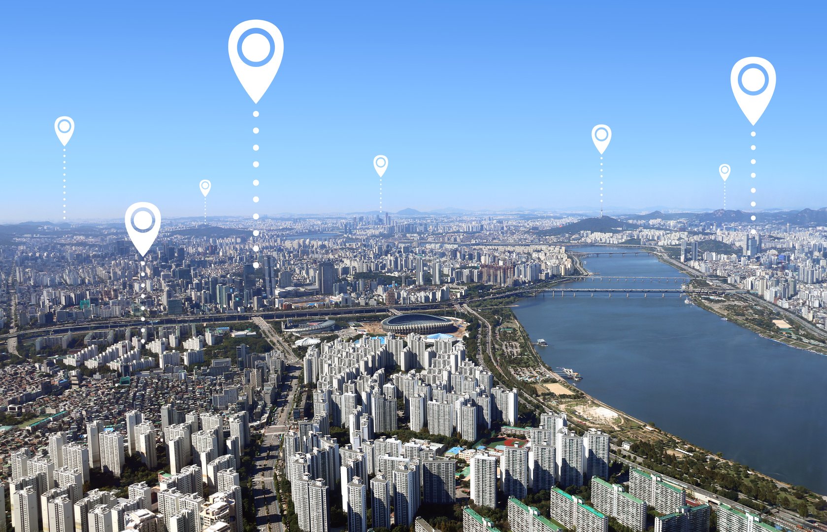 Network connection concept. Aerial view on cityscape of Seoul with white location pin. Top view of capital of South Korea. Global positioning system pin map. Modern travel, sightseeing and tourism