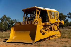 Bulldozers - Powerful land clearing, grading, and heavy-duty earthmoving operations