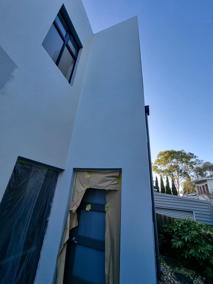 Rendered cladding after restoration showing beautiful finished exterior