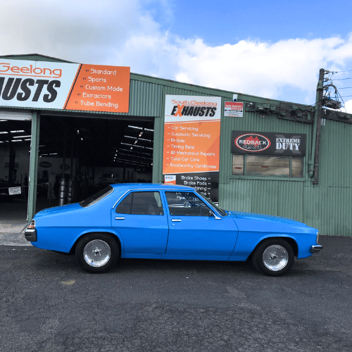 Chris and Andy mechanics at South Geelong Exhausts workshop with over 70 years combined experience