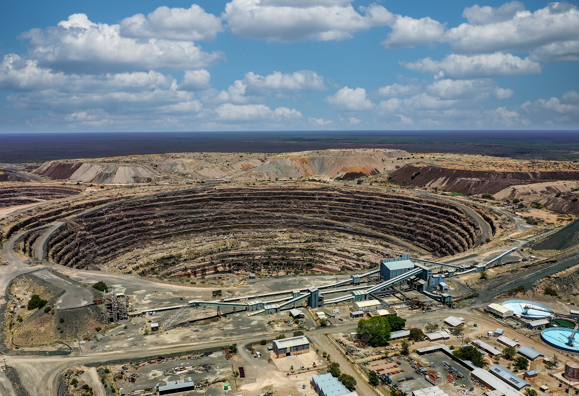 diamond mine aerial view open pit in Botswana, extraction of kimberlite from the quarry processed at nearby factory