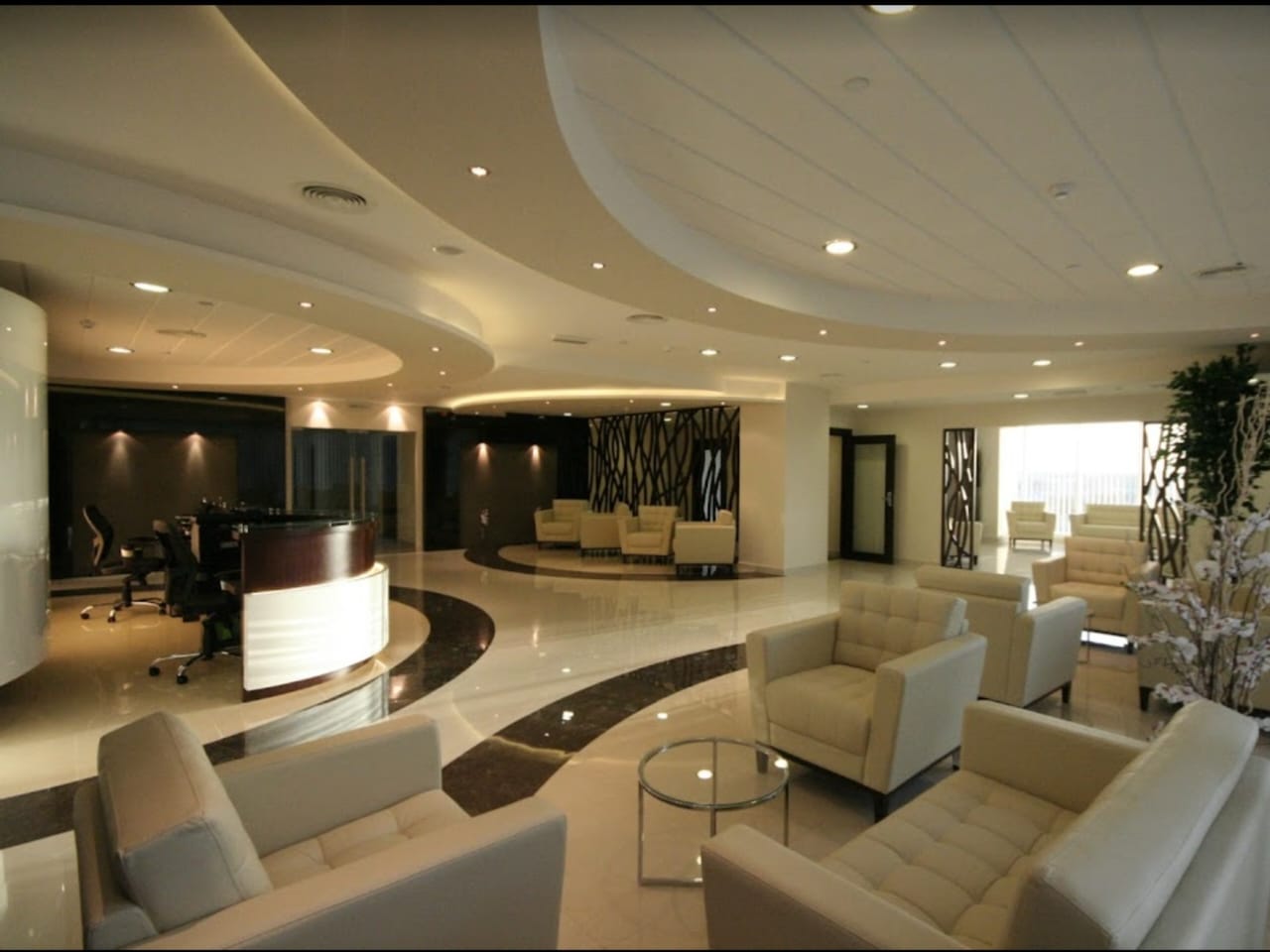 Doctor and medical staff walking through hospital corridor