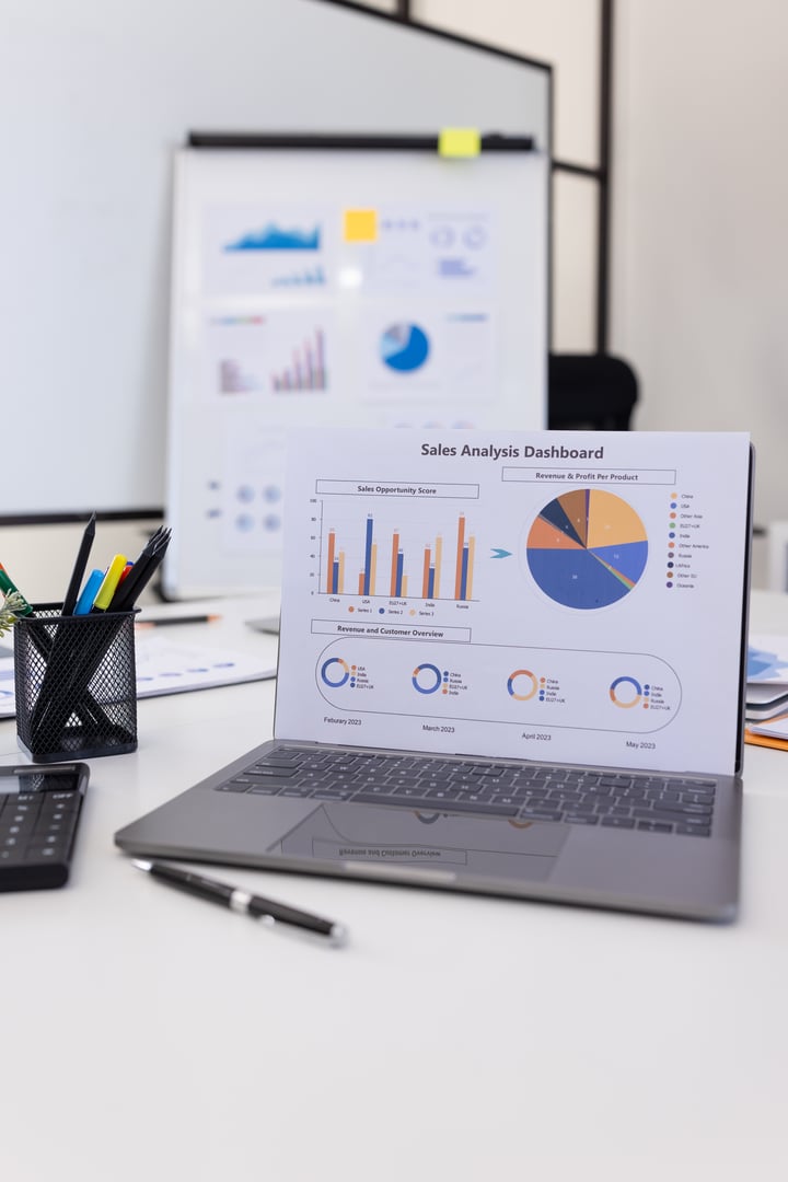 Business and technology concept. Laptop computer and dashboard analysis and data management a meeting table in office.