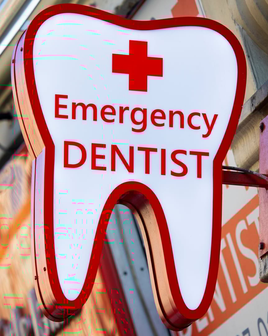 London, UK - March 8th 2022: Close-up of an Emergency Dentist sign.