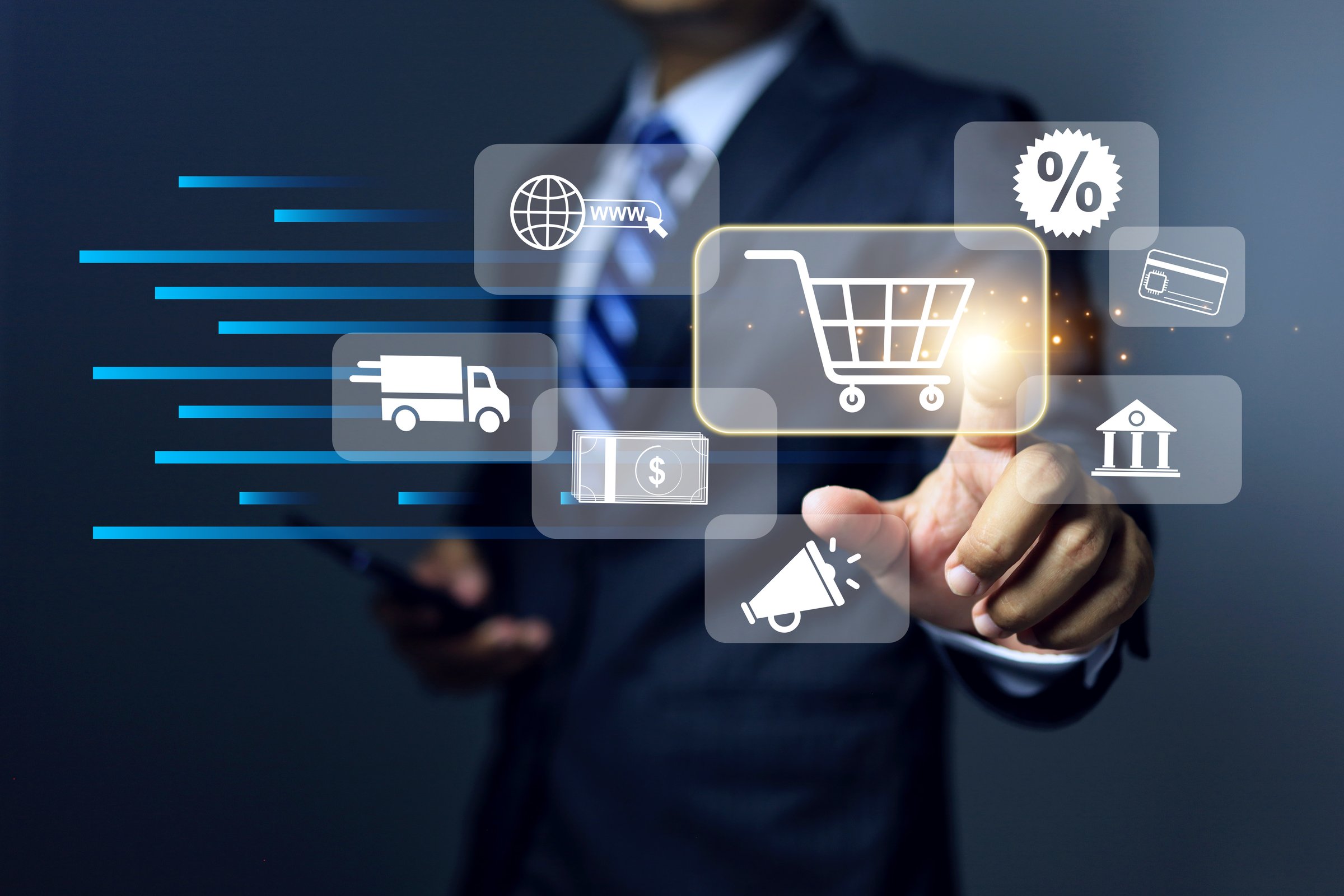 Digital marketing and online shopping concept with a businessman pointing on virtual interface infographics to show new sale promotion and announce to customers in attractive terms