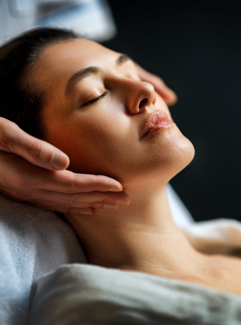 Facial treatment in spa salon. Skin care and massage. Cosmetologist at work