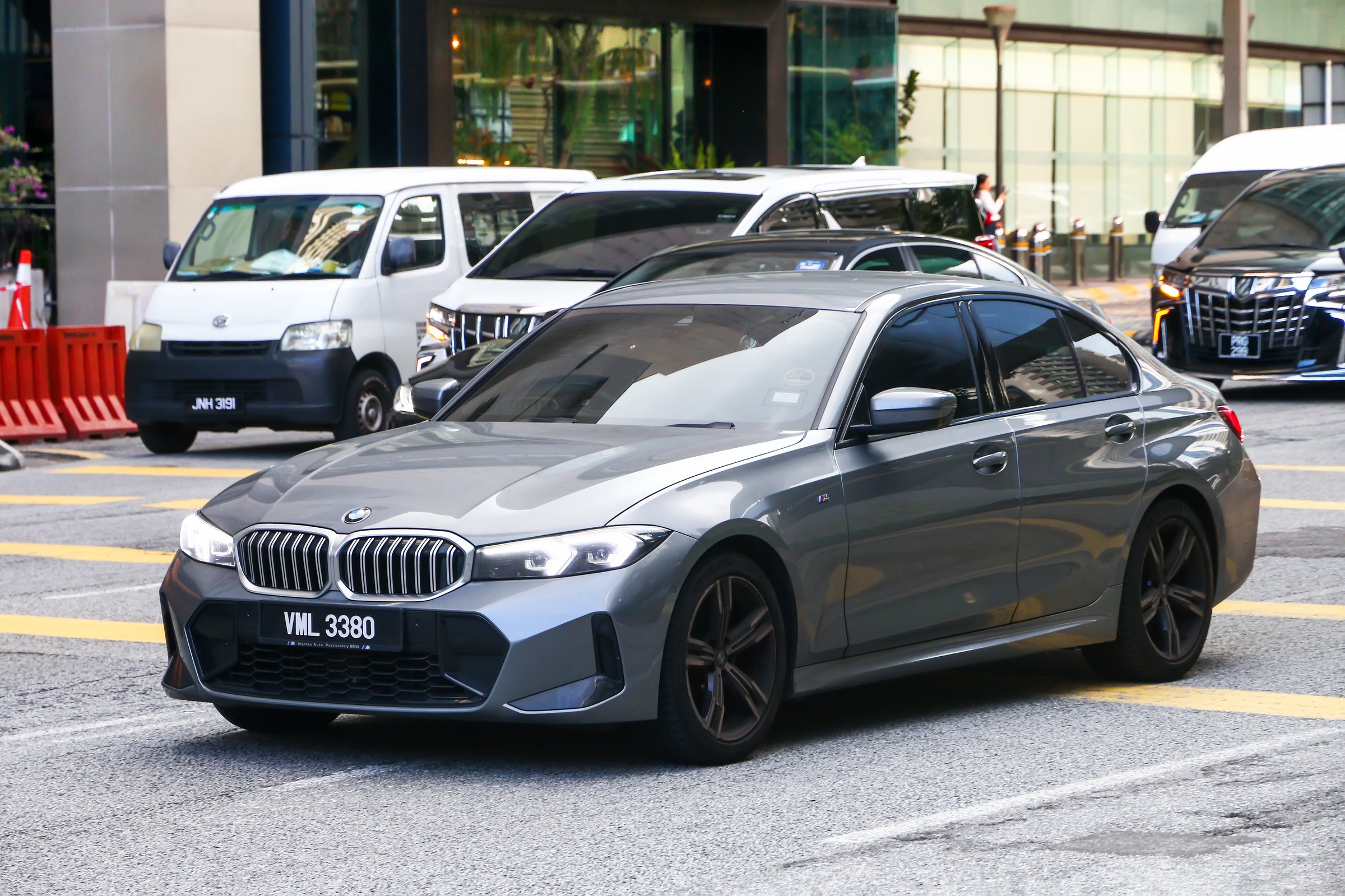 Kuala Lumpur, Malaysia - February 20, 2025: German executive compact saloon car BMW 3-series (G20) in the city street.