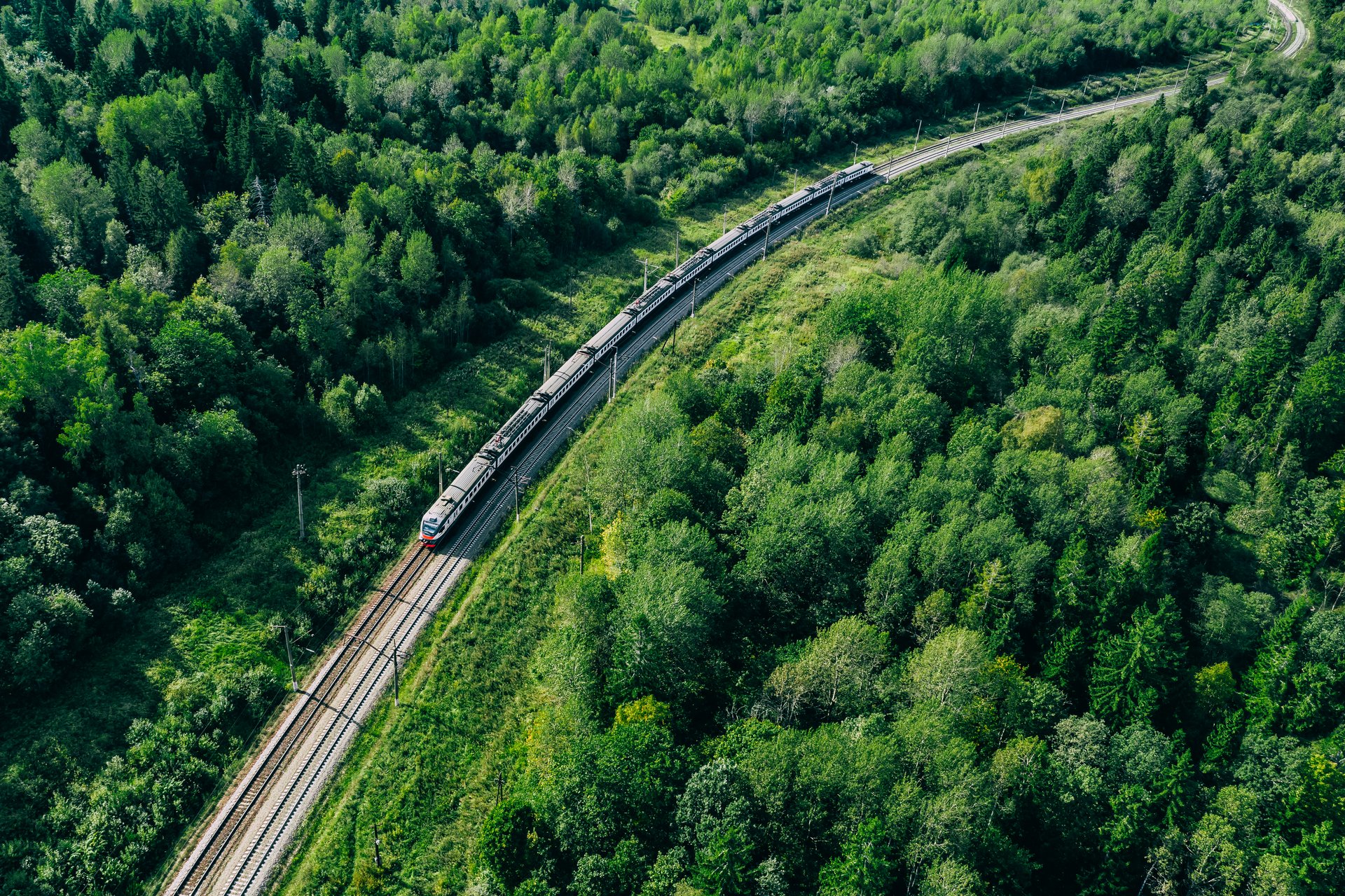 Sustainable railway corridor through green landscape