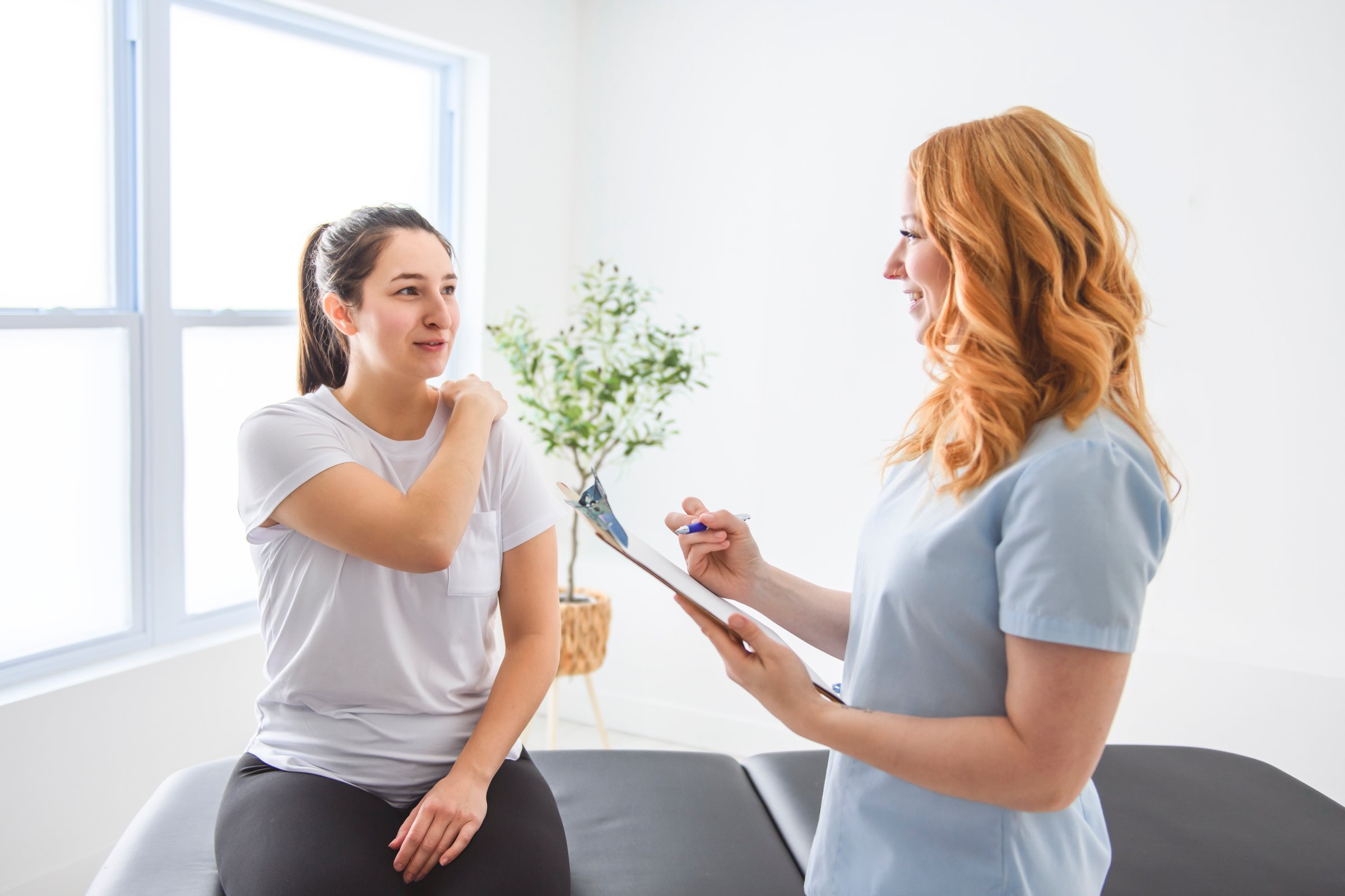 A Modern rehabilitation physiotherapy at work with client