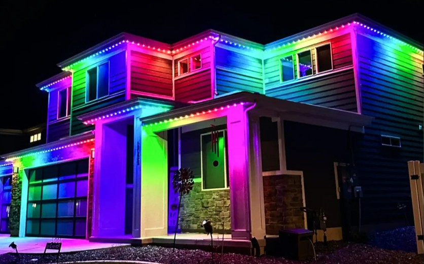 Two-story house with rainbow pattern LED lighting