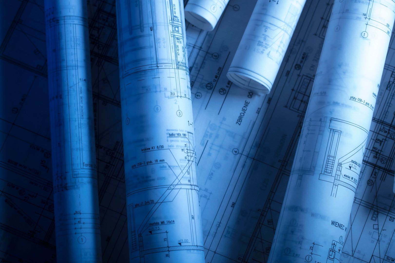Workplace of architect. Rolls of blueprints.