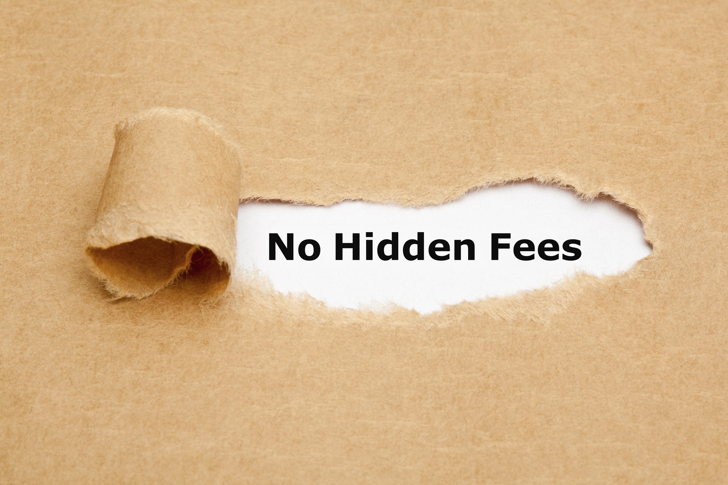 The massage No Hidden Fees appearing behind ripped brown paper.