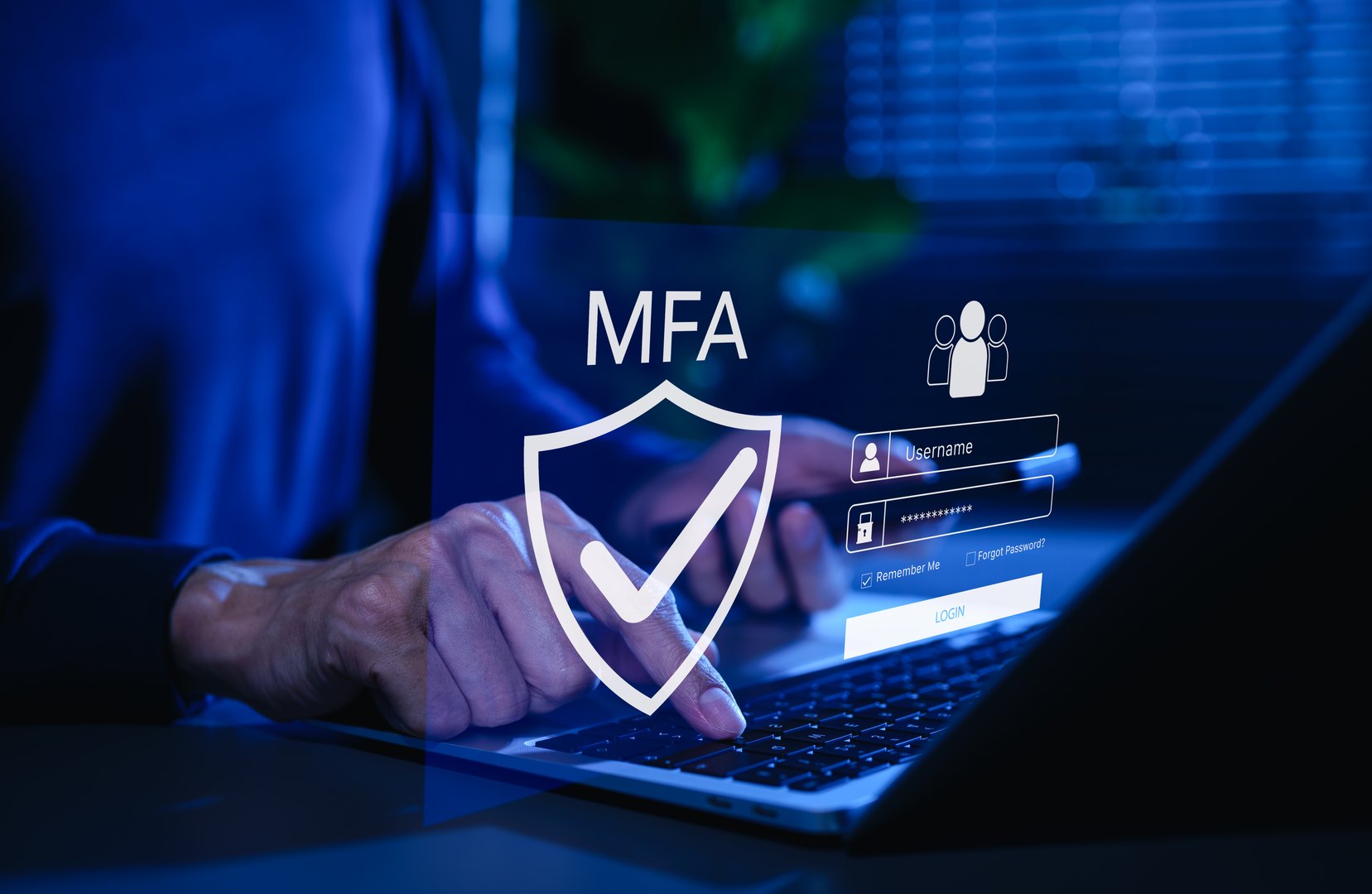 MFA, Multi-Factor Authentication Security Concept. Person typing on laptop with MFA shield icon and login interface, representing multi factor authentication, secure login, cybersecurity protection.