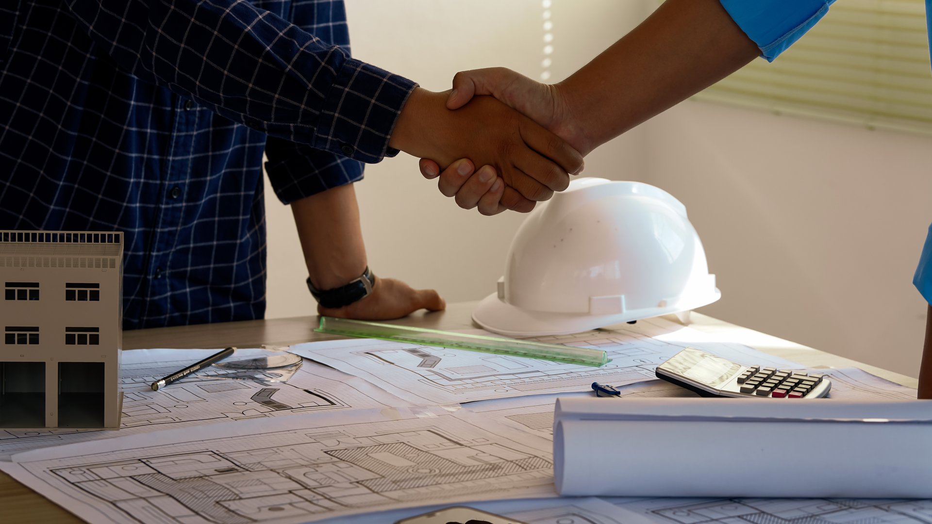 Engineer Teamwork Meeting for project working with partner on model building and engineering tools in working site