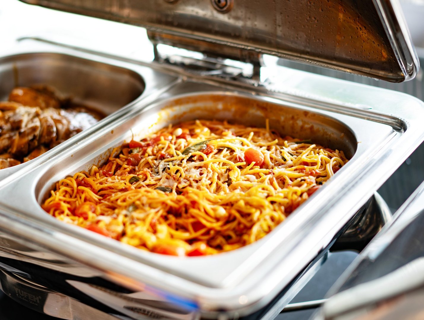 spaghetti  with cheese ball in tray buffet