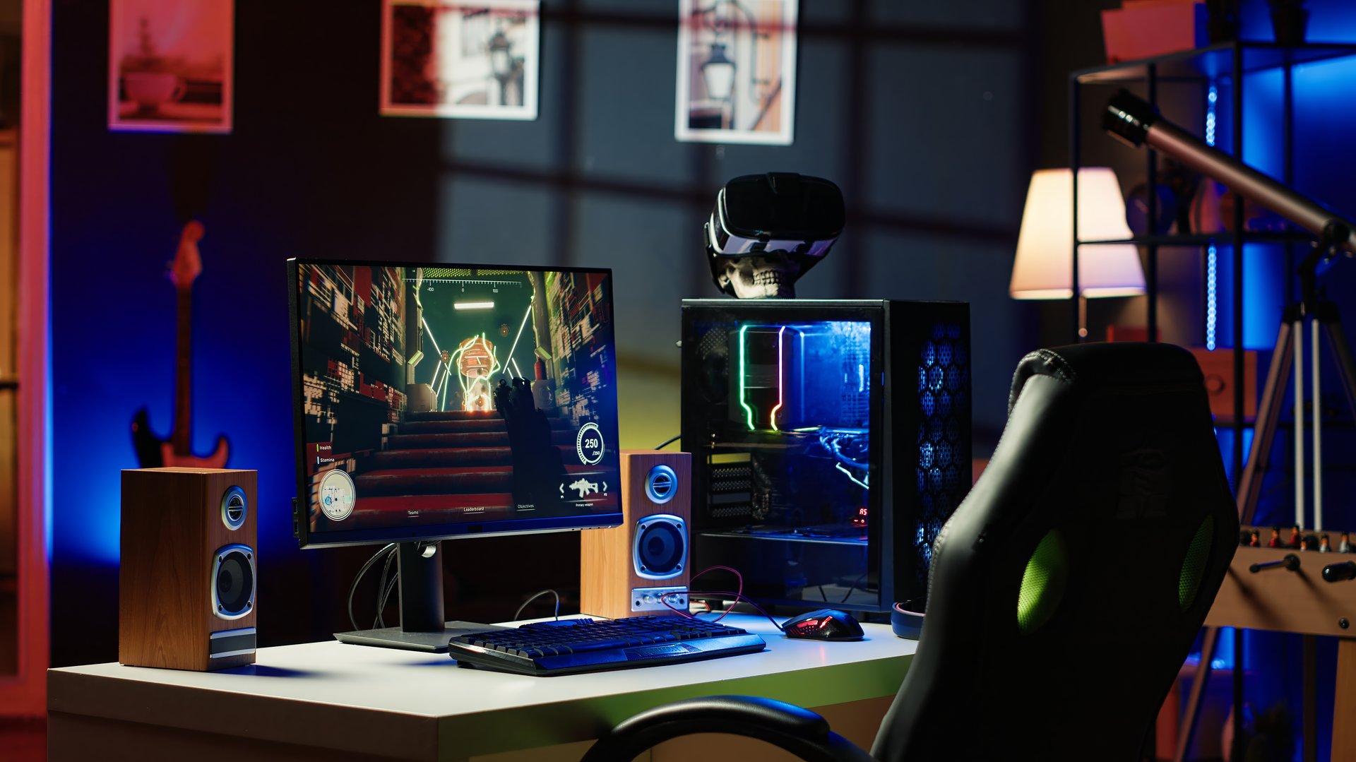RGB lights illuminated components on open gaming PC tower next to computer peripherals, display and VR headset in empty apartment. Desktop PC in home living room, monitor and virtual reality glasses