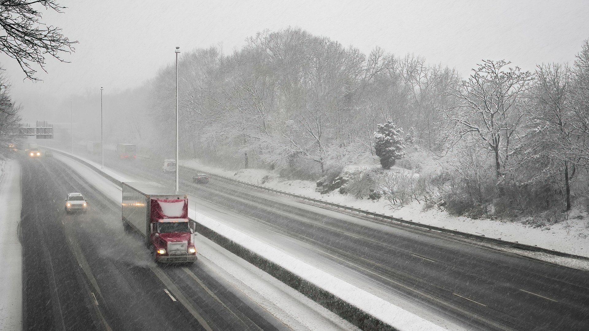 Norwalk, CT, USA - February 13, 2024:  View from I-95 during  snowstorm in February 2024 on East Coast