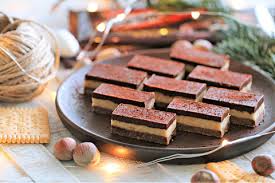 Bajadere - Elegant petit fours with biscuit, walnut, and chocolate layers