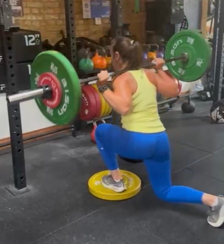 Woman exercising with weights