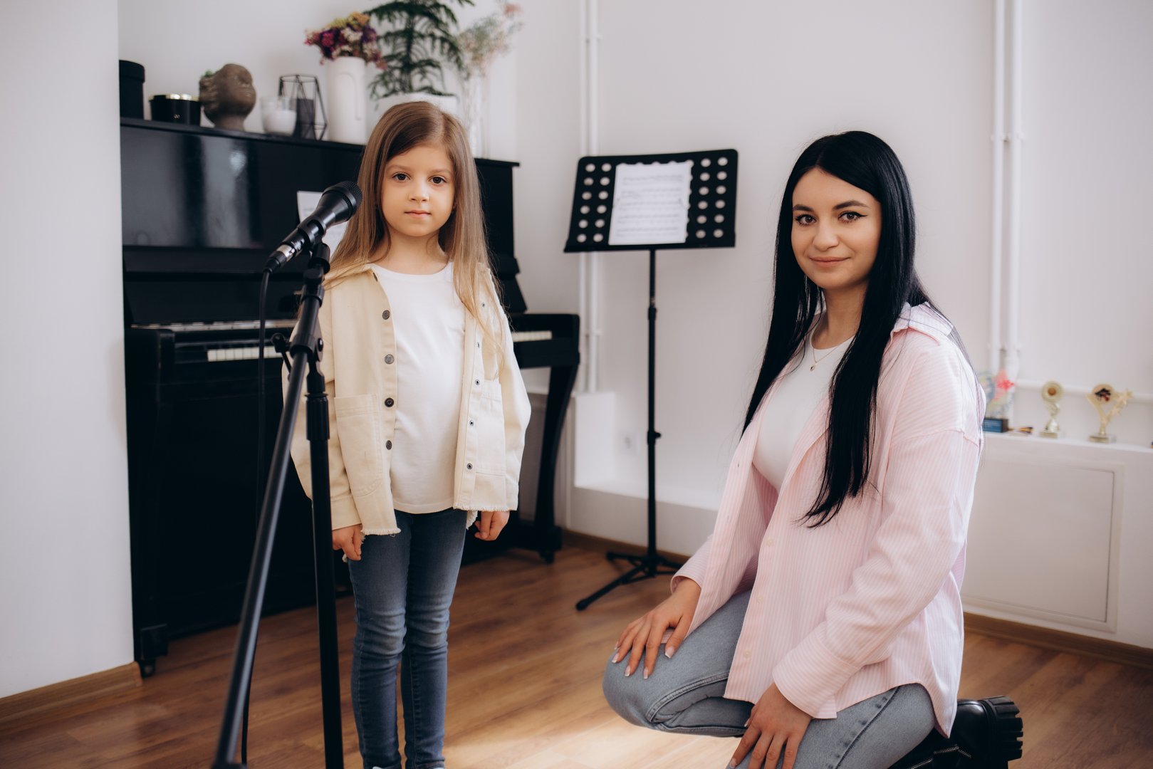 A little girl at a music school lesson