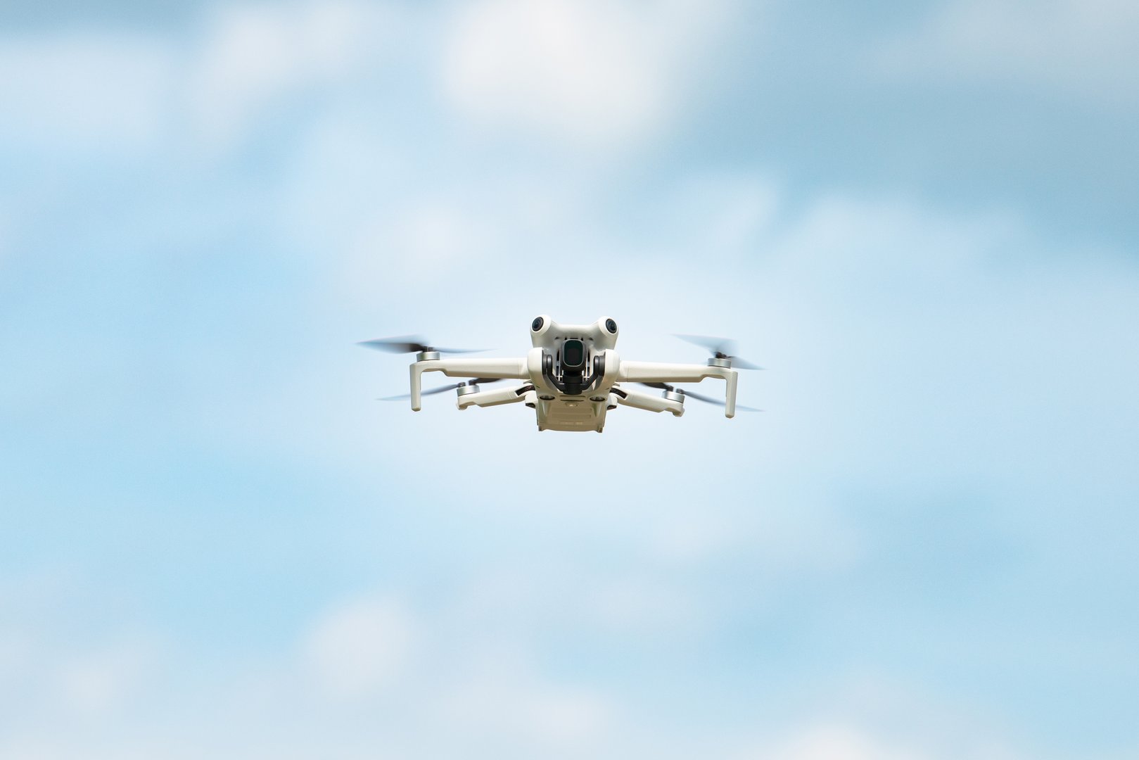 Flying drone in action, aerial copter, digital camera, modern technology used for photography, videography, surveillance and delivery service, agriculture, search and rescue, Trier, Germany, june 9th 2025