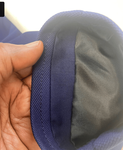 Tailor working on garment