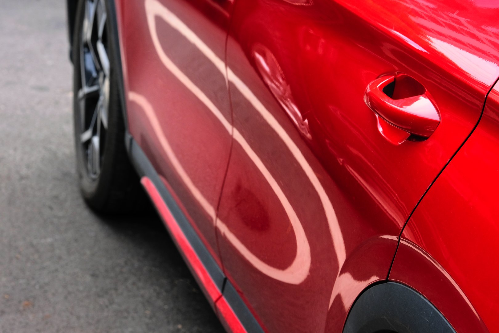 reflect of car and abstract form on metal