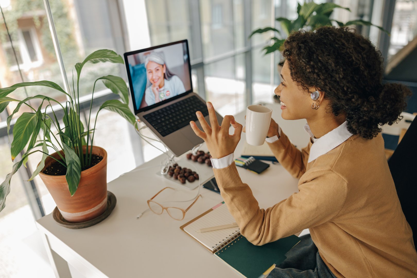 Professional female manager having video conference