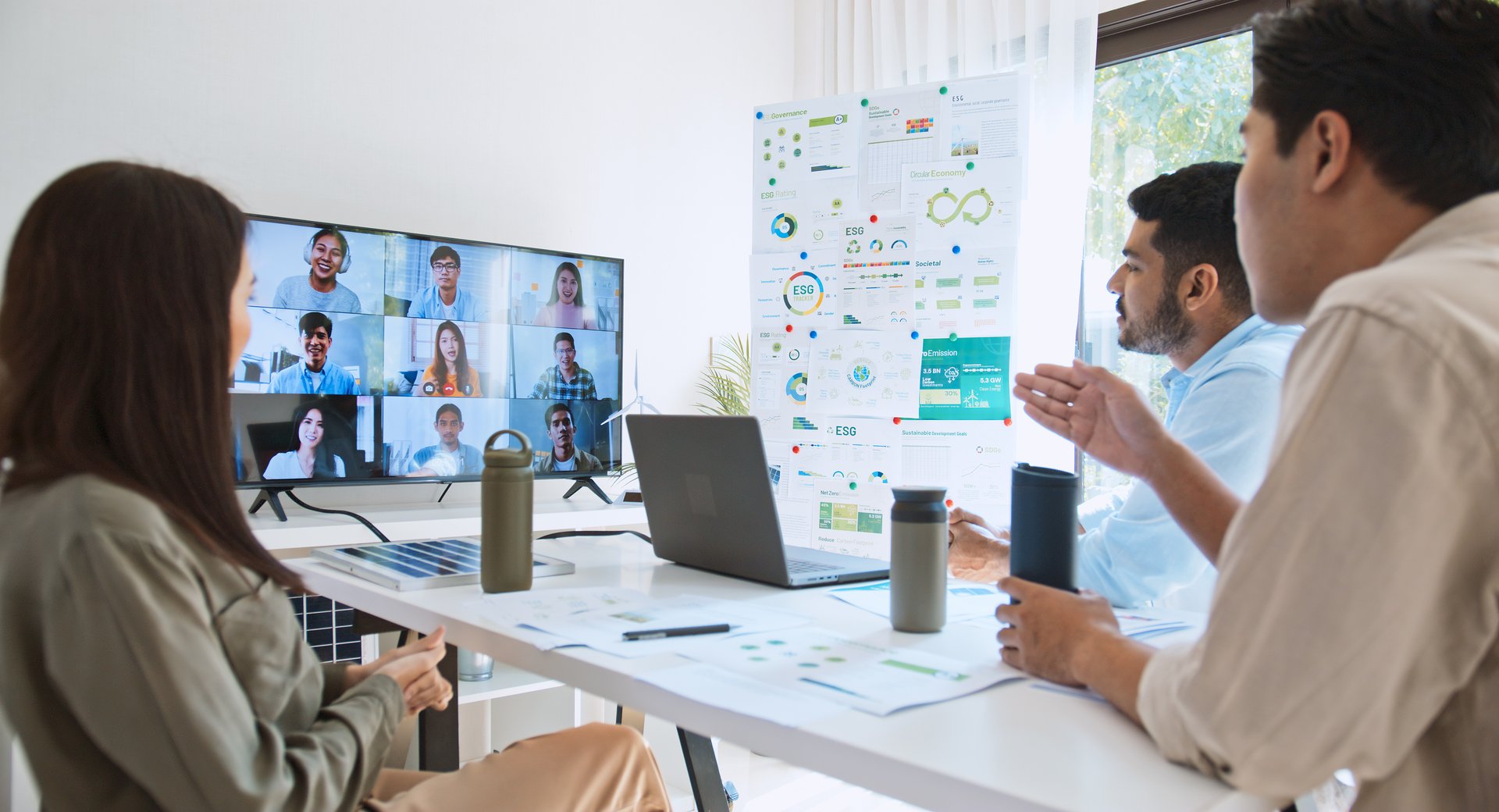 Young group of Asian businesspeople in team meeting, online video conference call on ESG (Environmental, social, corporate governance) discussion. Sustainable business practice, people work at home
