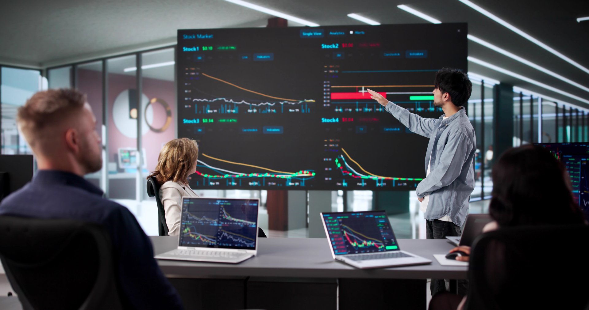 Brokers Analyze Past Trades In Office, Trading On Stock Market. Company's Diverse Team Meeting In Office