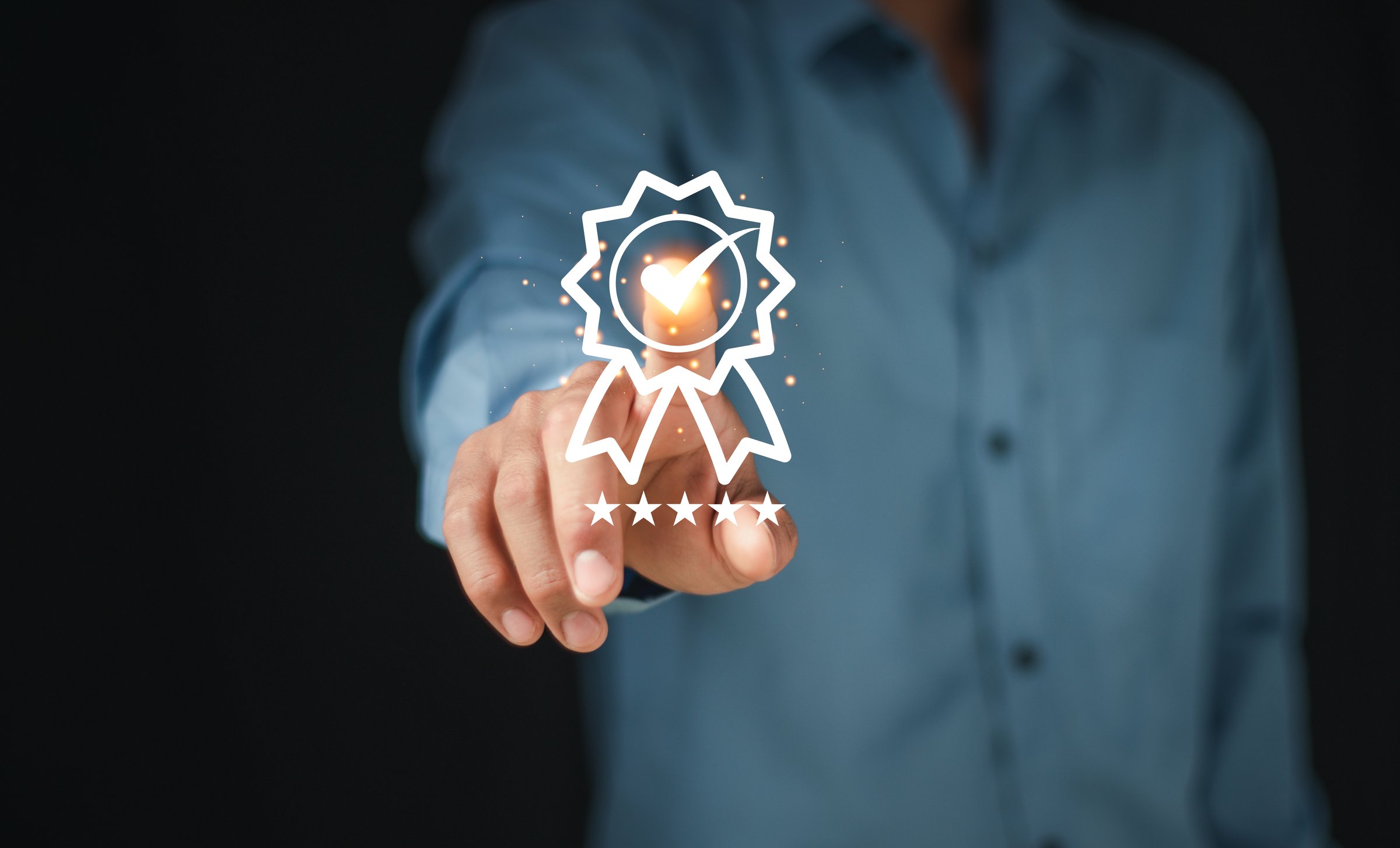 Businessman Hand touching on the sign of the top service the best Quality assurance, Guarantee, Standards, ISO certification and standardization concept. guarantee product and ISO service concept.