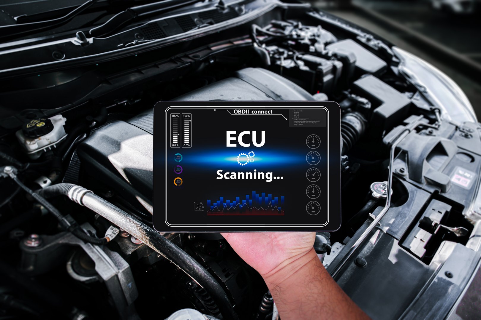 Car mechanic inspect a car engine system with a OBD2 or OBDII scanner , Car repair concept