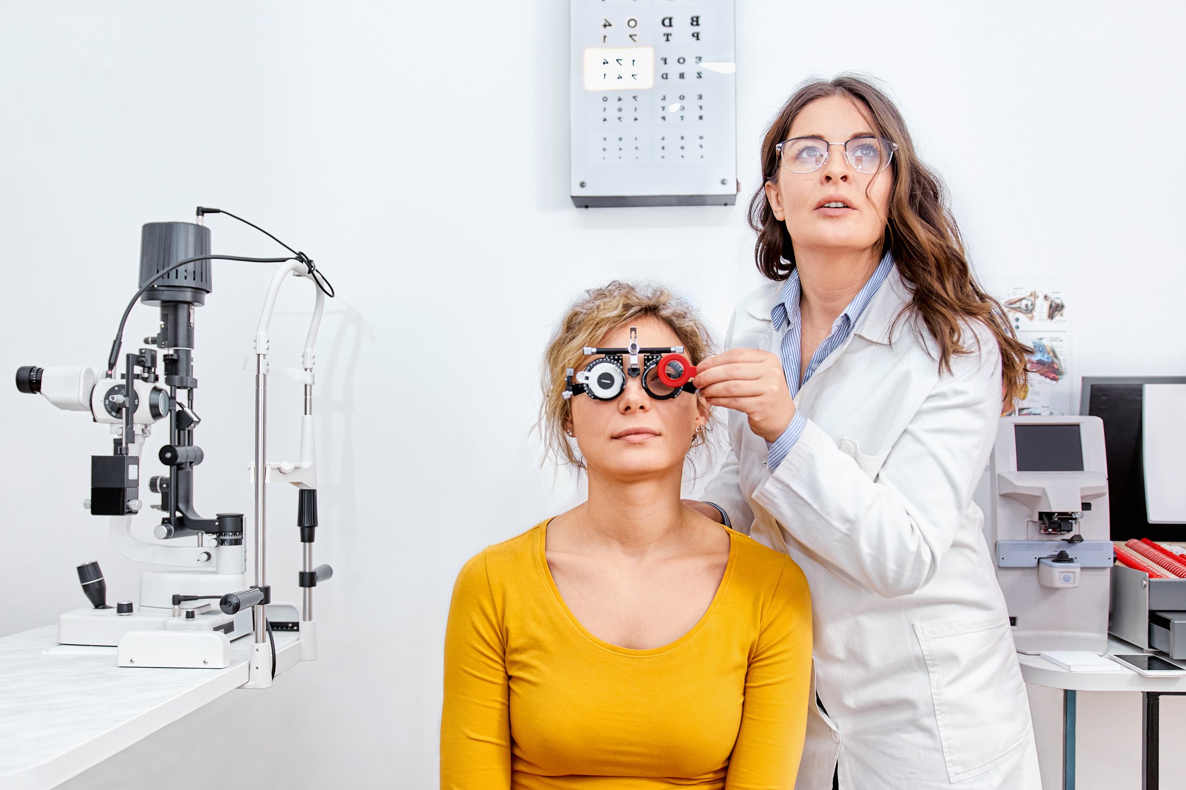 Optometrist performing an eye exam