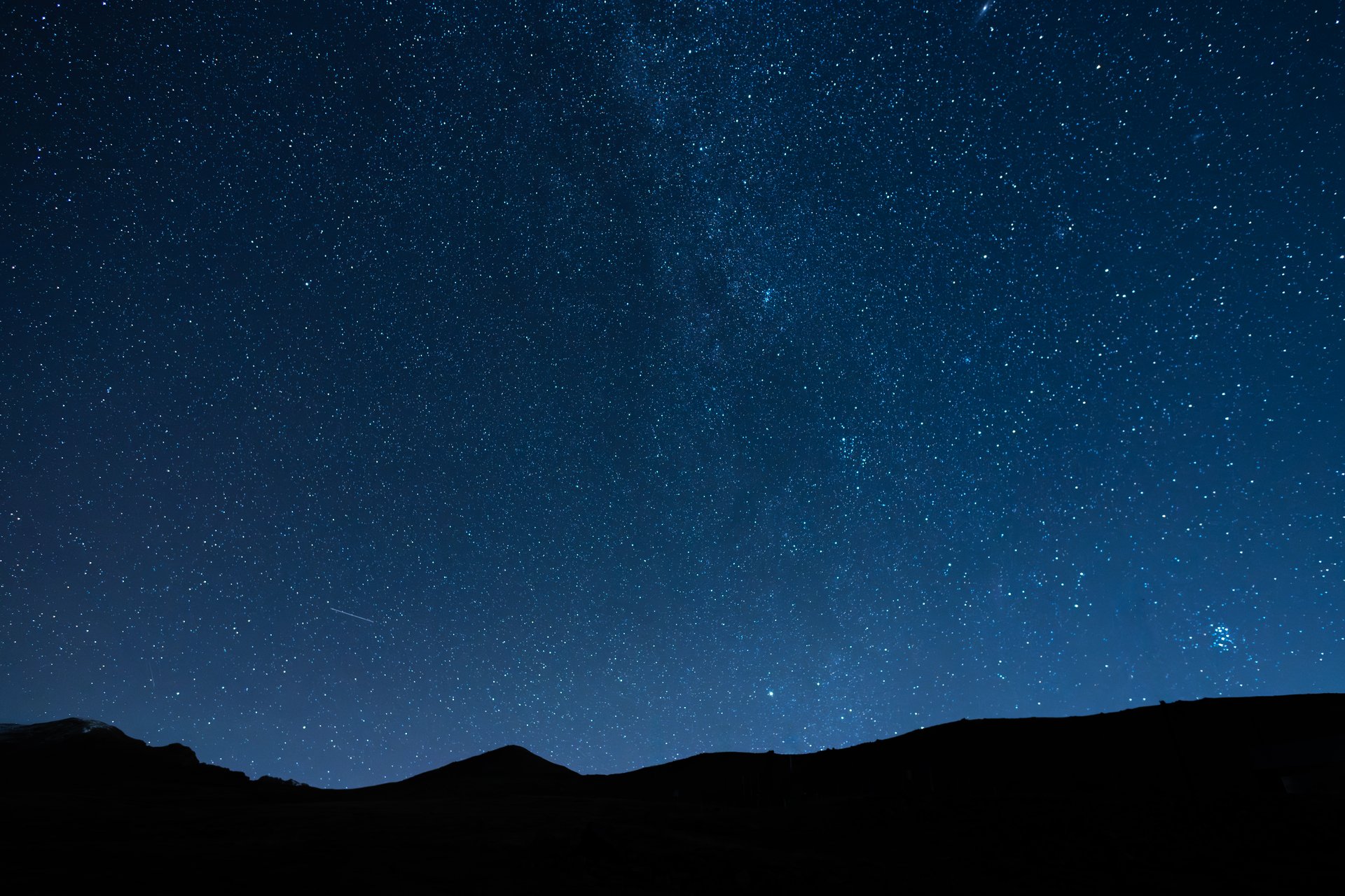 Beautiful night landscape, Bright Milky Way galaxy over the mountains, starry sky.