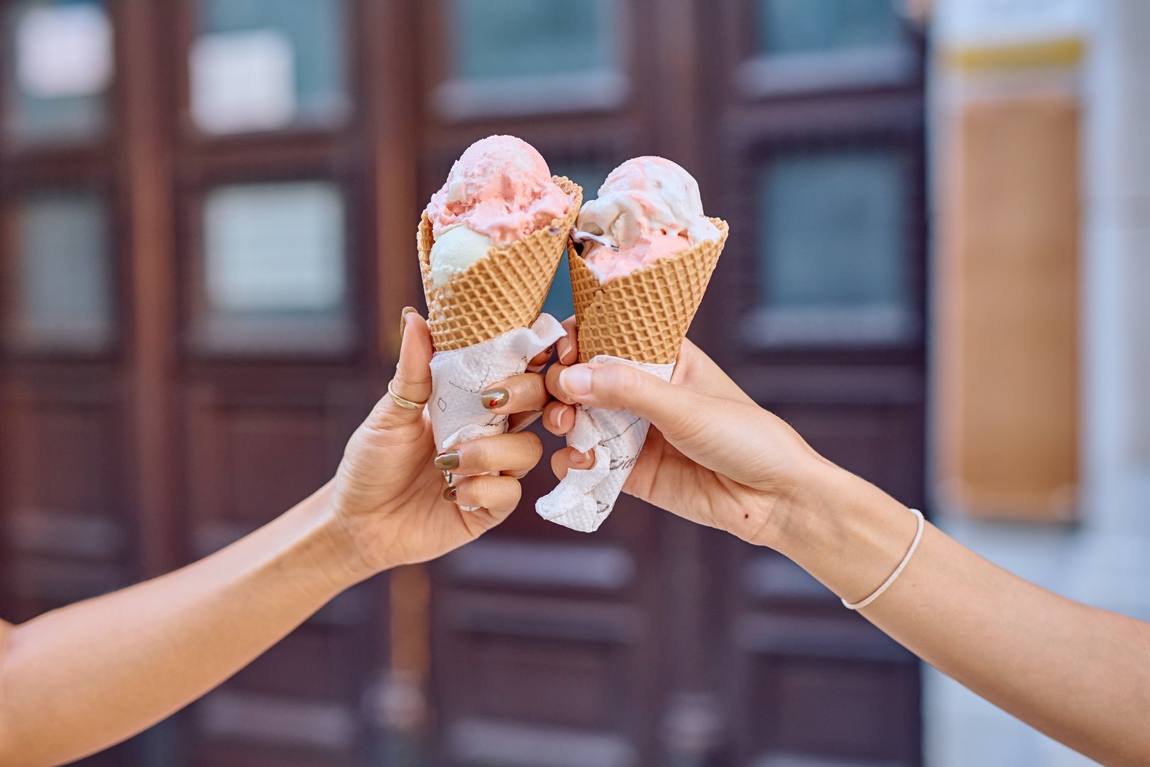 Woman serving ice cream in shop