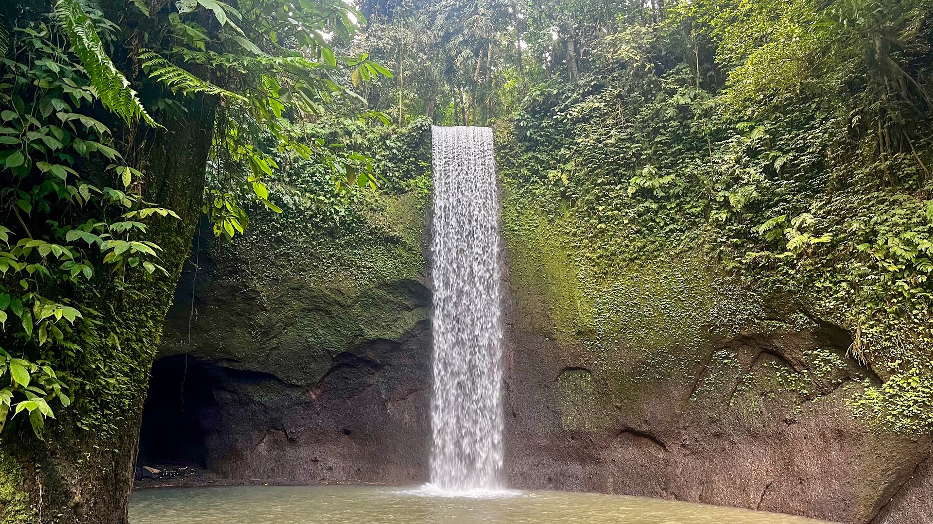 Tibumana Waterfall cascading into the pool in Bali, Indonesia