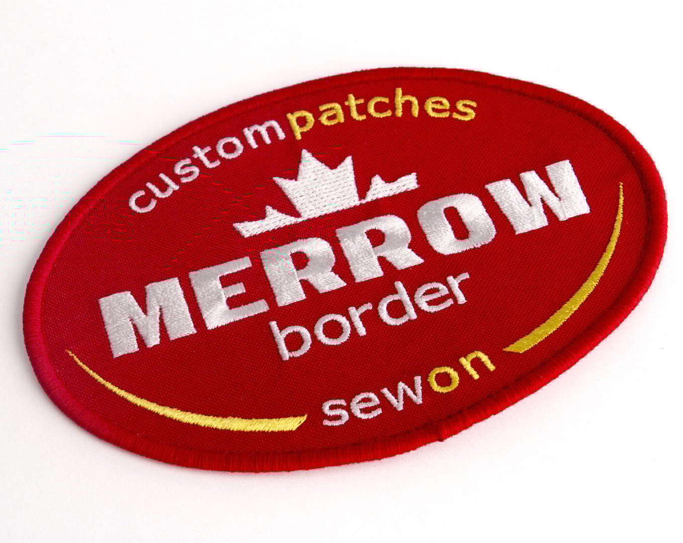 Red oval patch with text: custom patches, MERROW border, sewon, and a white leaf emblem, showcasing embroidery style.