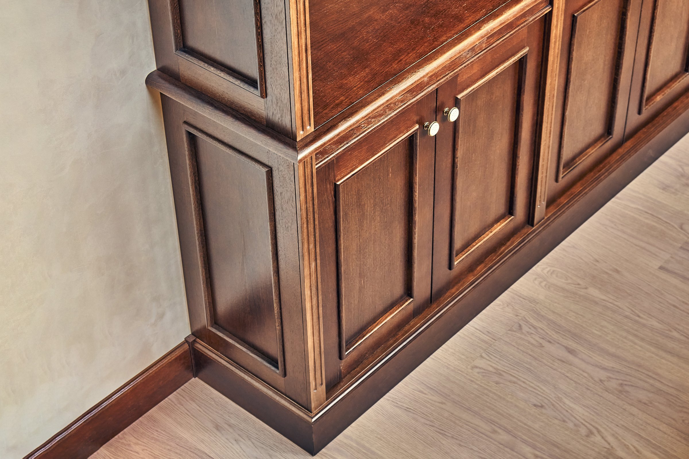 Home library. Detail of antique wooden bookcase with empty shelves placed in home library in house
