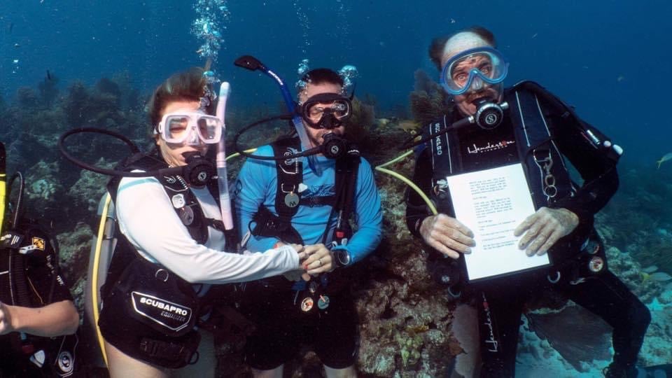 Underwater wedding ceremony with Captain Slate's Scuba Adventures