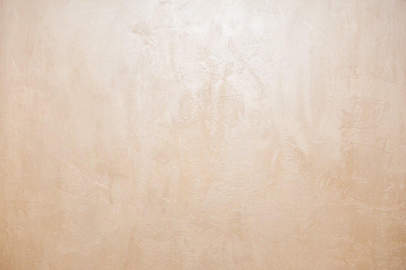 Wall decor Venetian decorative plaster with glitter paint. Background, abstraction. Apartment renovation concept.