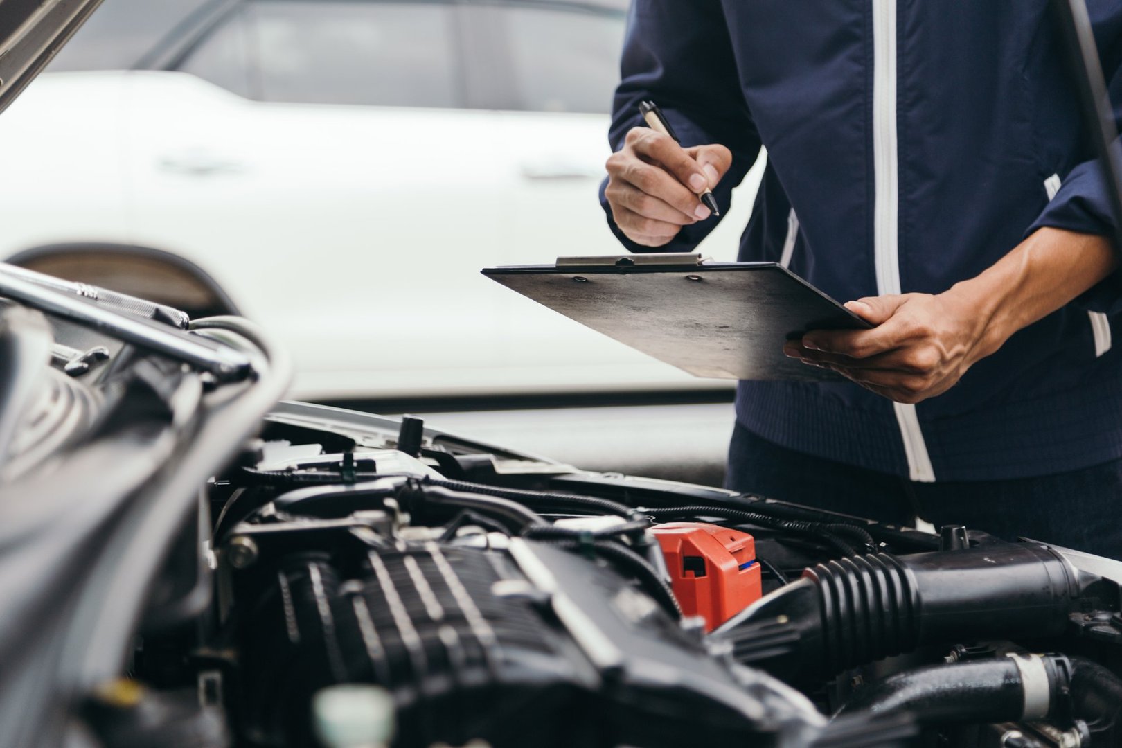 Automobile mechanic repairman hands repairing a car engine automotive workshop with a wrench, car service and maintenance,Repair service.