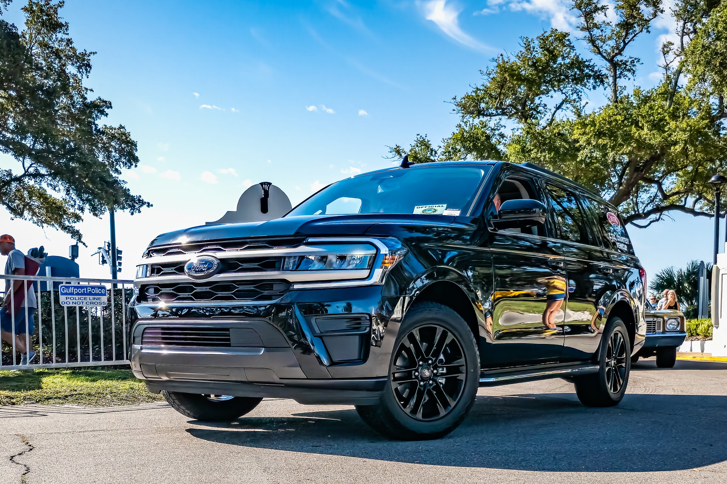 Gulfport, MS - October 02, 2023: Low perspective front corner view of a 2023 Ford Expedition XLT SUV at a local car show.