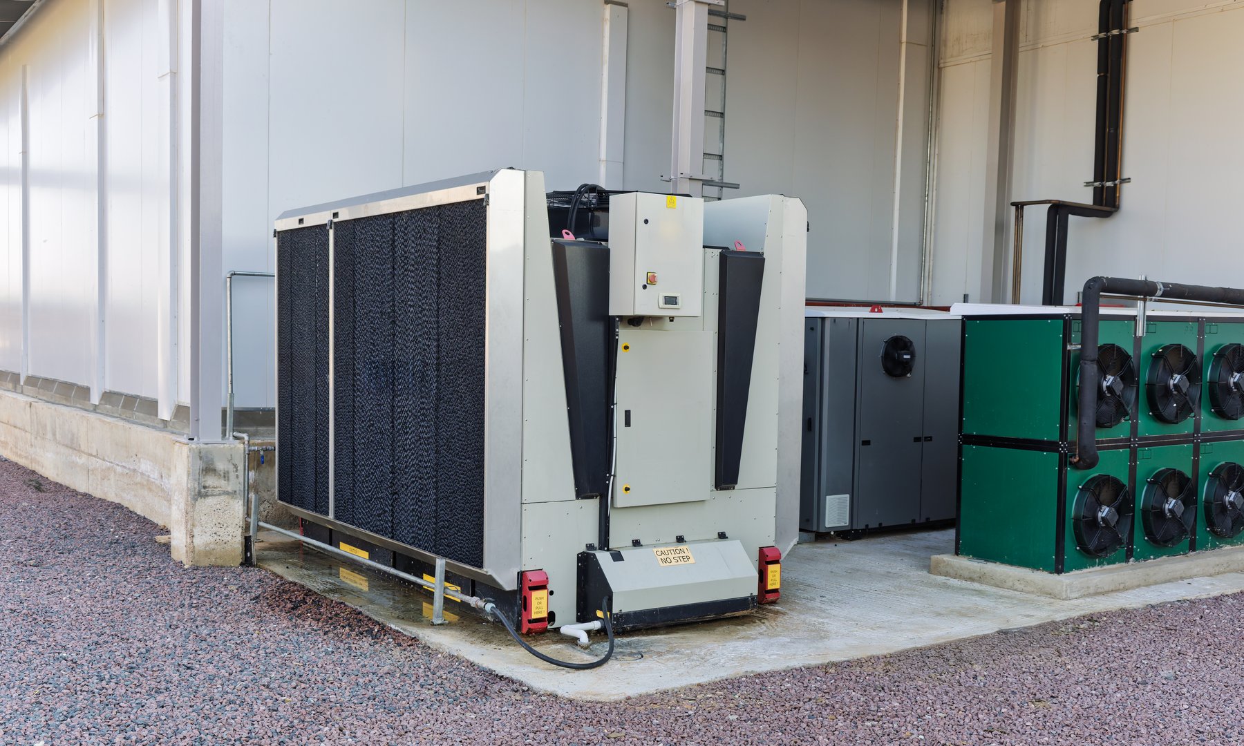 Large industrial outdoor air-cooled condensing unit machinery for commercial HVAC climate control systems and process applications