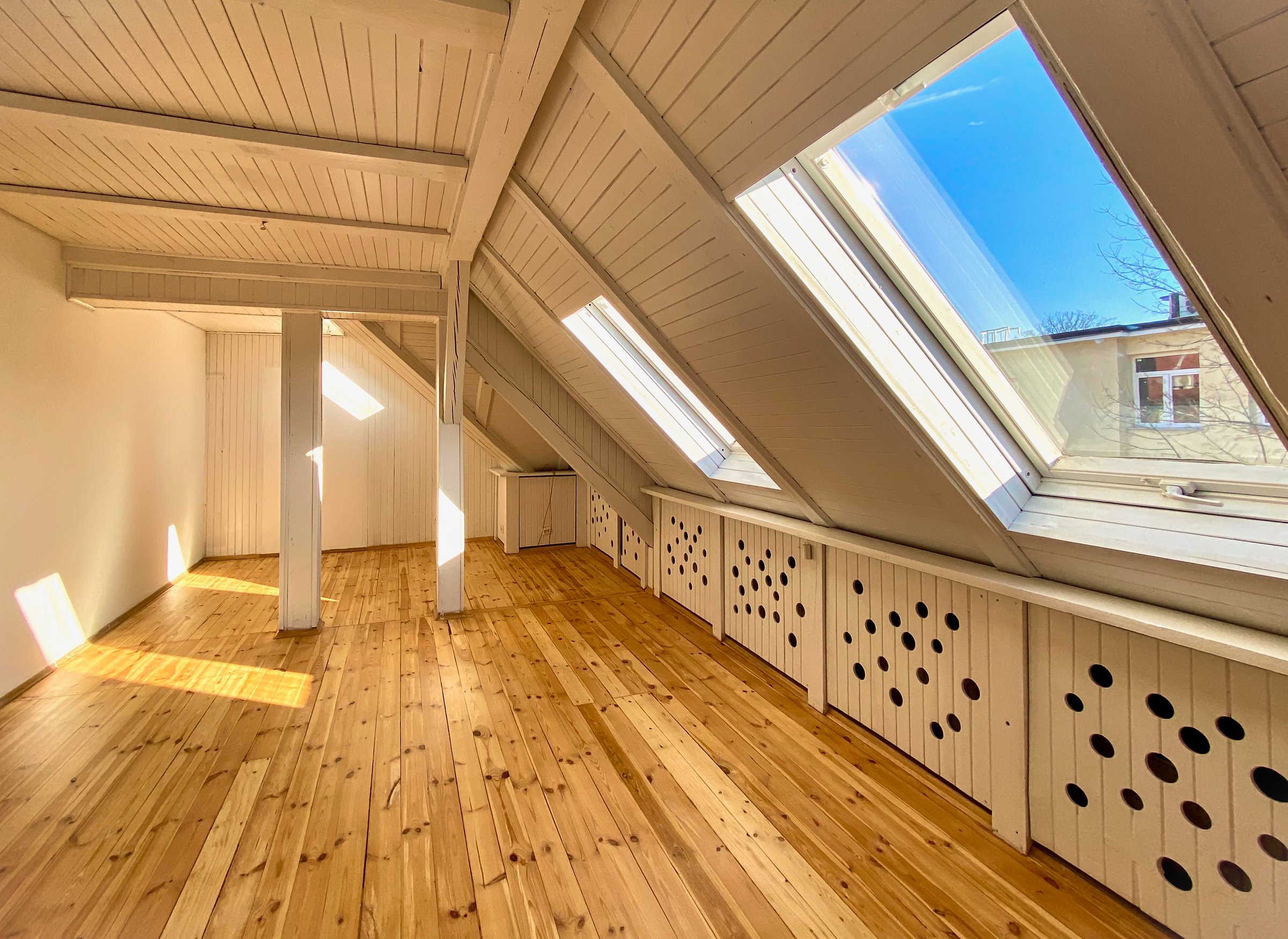 Attic in an old, vintage, retro classic, pre WW II war house. 100 years old villa. Pine wood finish.