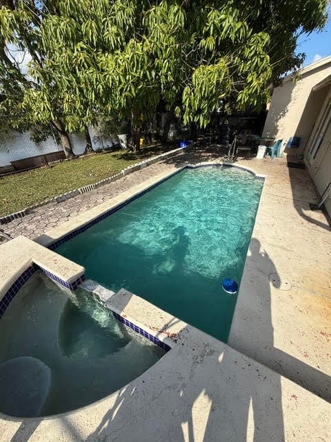 After image of a sparkling blue pool