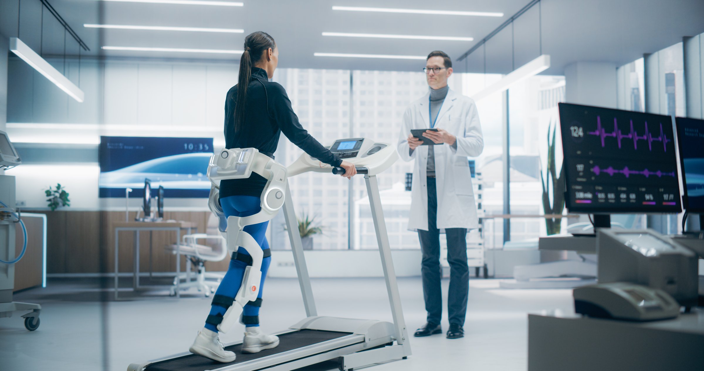 Woman in a Futuristic Medical Lab Uses an Advanced Exoskeleton on a Treadmill for Physical Rehabilitation, High-Tech Technology and Innovative Research in Recovery Techniques
