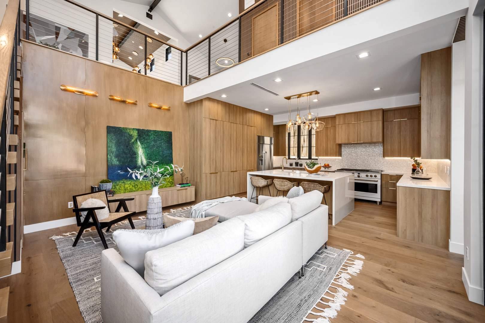 SWFL luxury home sold - modern interior with staircase featured on Instagram