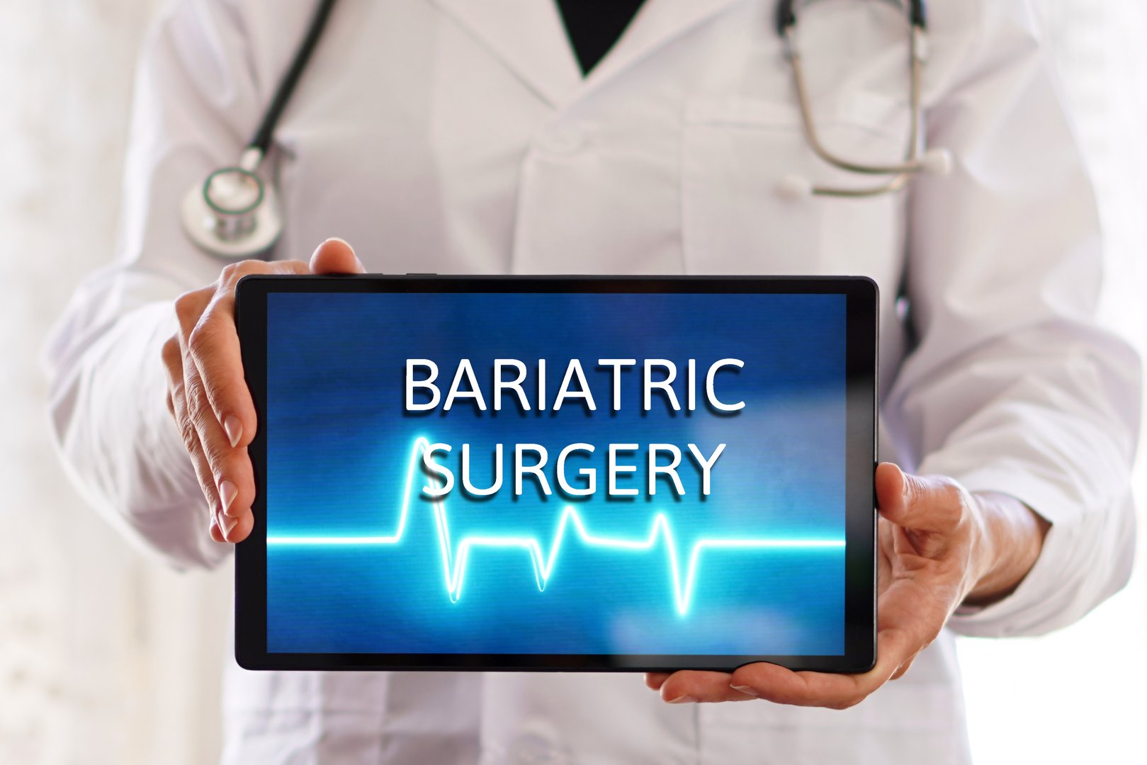 bariatric surgery, medical prescription on a tablet in the hands of a woman doctor