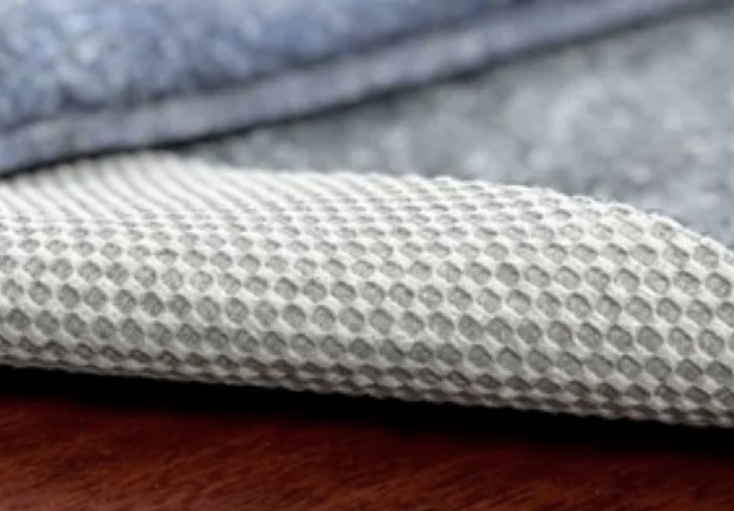 Foundation Ultra Lite Slide Stop rug pad - thin low profile non-slip backing for lightweight rugs with easy trim custom fit